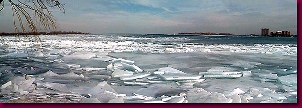 Ice breaking up against the upriver shore of Belle Isle